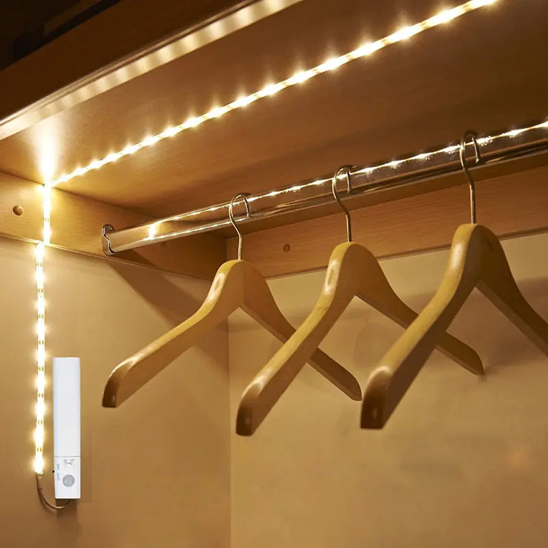 LED Motion Sensor Light Strip installed in closet under shelf and clothing rod
