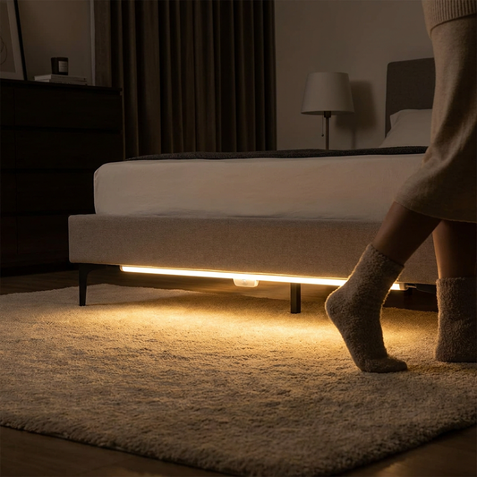 LED Motion Sensor Bed Light Strip in use under bed in dark bedroom